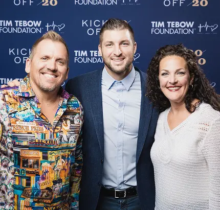 Tim Tebow with Art and Julie McPherson